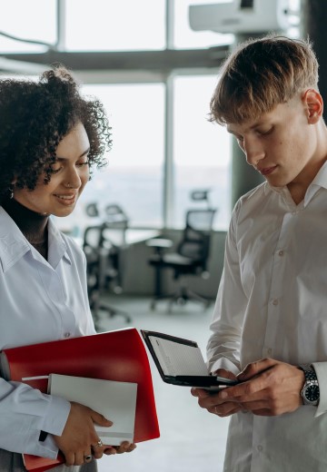 Young business people standing next to each other